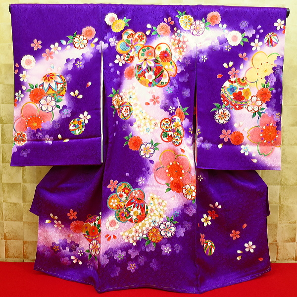 お祝い着・初着・祝着・のしめ 黒地・鼓・扇・花の柄 初着・祝着・のしめ 金彩ねじ梅と毬・紫