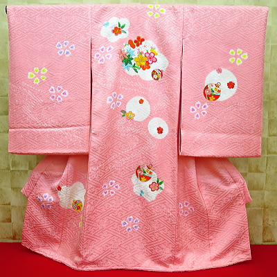 花くす玉・鈴・紗綾型紋様・ピンク 初着 お祝着 のしめ 産着 お宮参りの着物